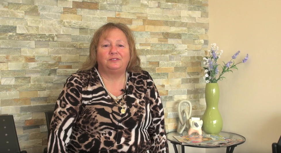 patient talking about her dental implant at Durham Dental Implant Solution