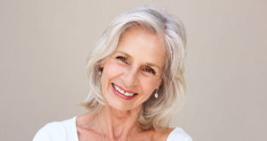 a natural looking smile after getting implants