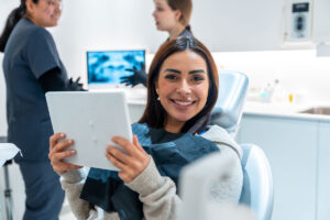 Patient Looking at cost of dental implants